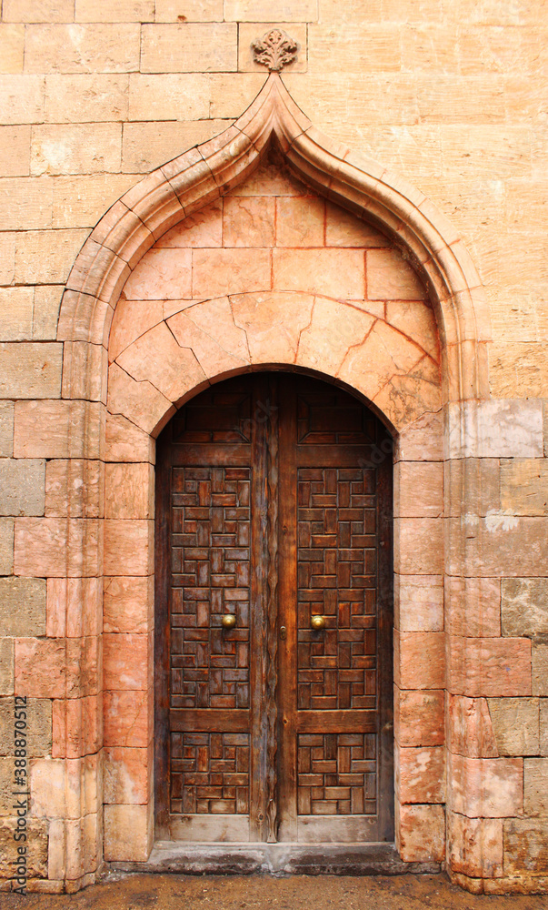 Traditional door with stones
