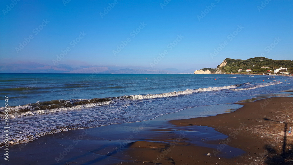 view of the coast of the region sea from Corfu with Albania in the far distance