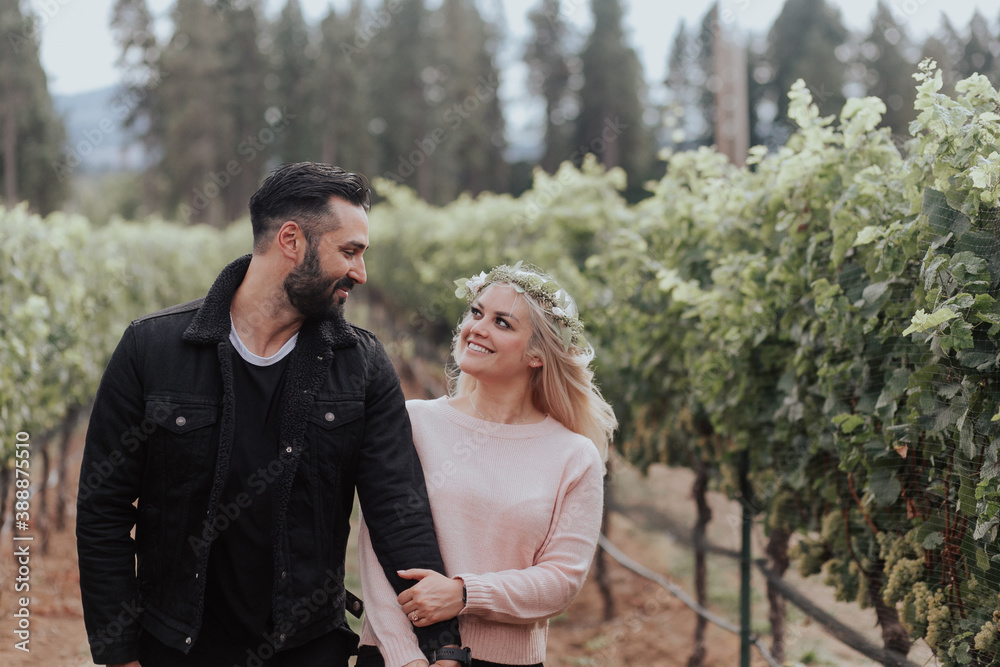 Loving Couple Looking at Each Other in Vineyard Loving Couple Looking at Each Other in Vineyard