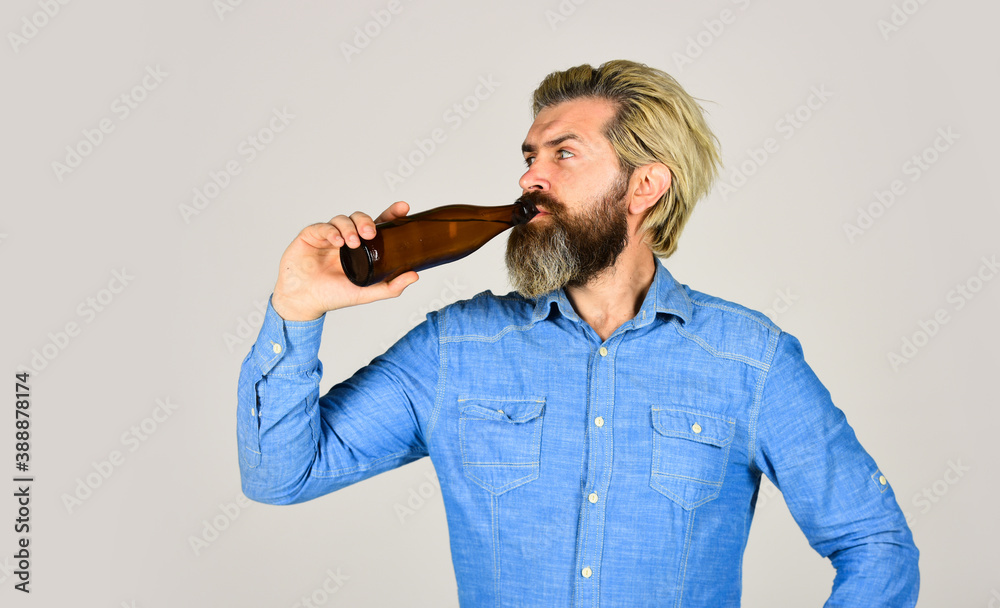 Learn how to make beer at home. Making Homemade Kombucha. Refreshing lemonade. Soda drink. Hipster at bar. Man beard and mustache hold bottle. Alcohol drink. Sparkling water drink. Cold beverage Learn how to make beer at home. Making Homemade Kombucha. Refreshing lemonade. Soda drink. Hipster at bar. Man beard and mustache hold bottle. Alcohol drink. Sparkling water drink. Cold beverage