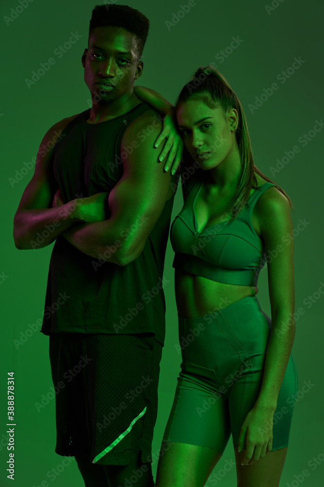Confident diverse athletes looking at camera Confident diverse athletes looking at camera