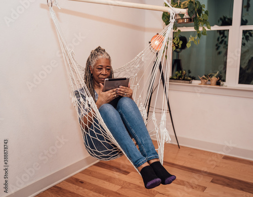 Woman in Hammock Reading photo