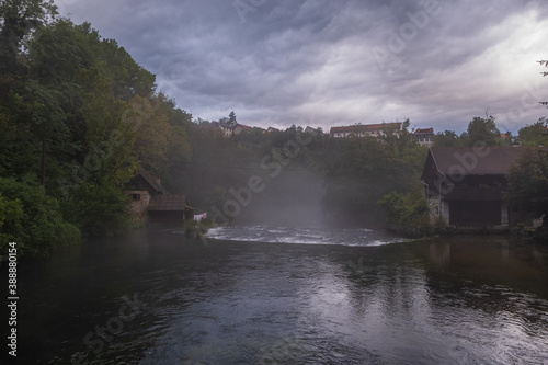 Village of Rastoke near Slunj in Croatia, old water mills on waterfalls of Korana river, beautiful countryside landscape. Sunrise in august 2020 © Сергій Вовк
