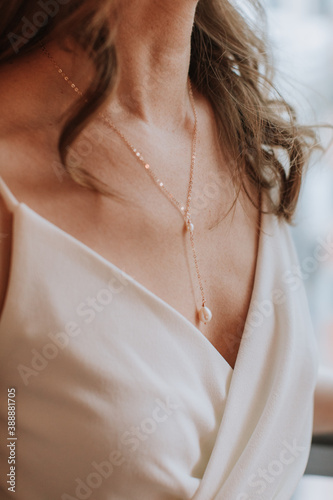 Closeup of Delicate Necklace on Bride photo