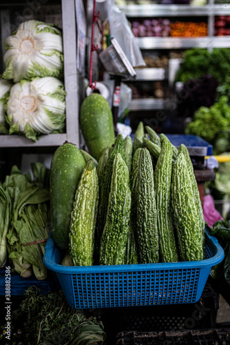 Cucumber and karela on a Peruvian market photo