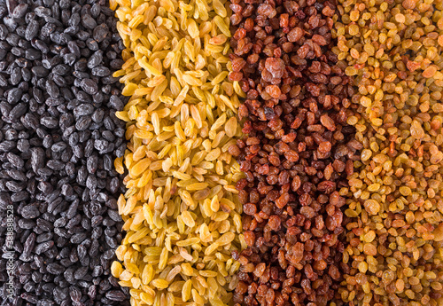 Background of different varieties of raisins. Dried grapes photo