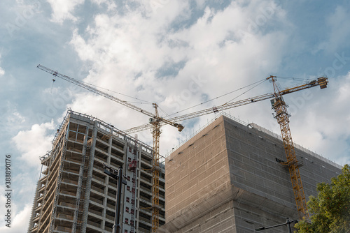 Tablou pe pânză Crane at construction site