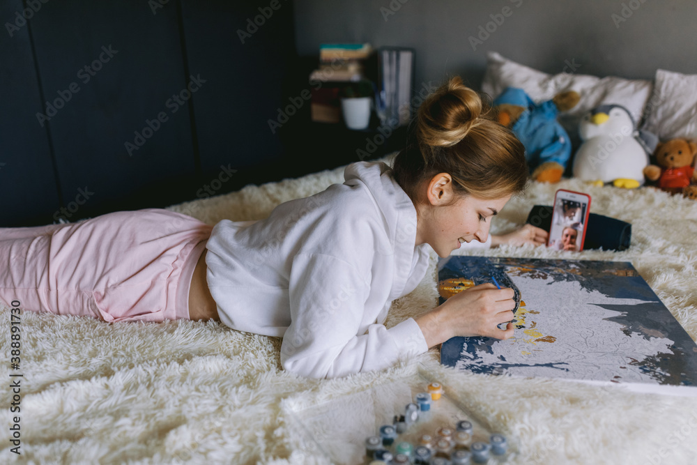 Girl relaxing and speaking online with friends. Girl relaxing and speaking online with friends.