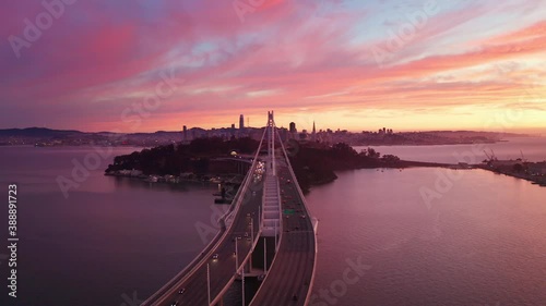 San Francisco Oakland Bay Bridge Aerial Cityscape Flythrough with Colorful Sunset