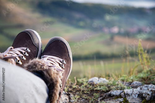 trekking boots on mountain top