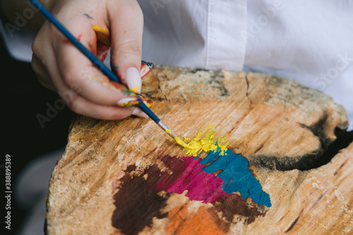 Female using yellow dye for her picture