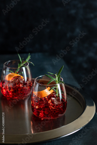 Classic Negroni cocktail with smoked rosemary garnish