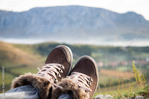 trekking boots on mountain top