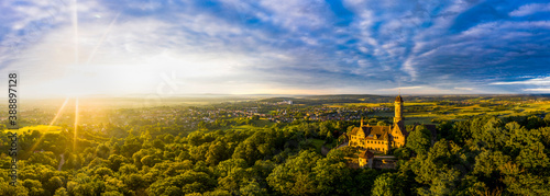 Germany, Bavaria, Bamberg, Helicopter panorama of Altenburg castle at summer sunset