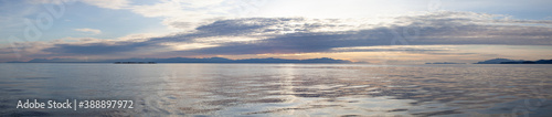 A beautiful panoramic sunset looking across Georgia Straight at Vancouver Island  Nanaimo  from the Sunshine Coast  British-Columbia on a calm day