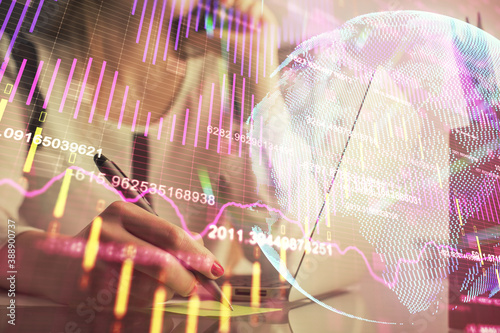 Wallpaper Mural Double exposure of woman hands typing on computer and financial graph hologram drawing. Stock market analysis concept. Torontodigital.ca