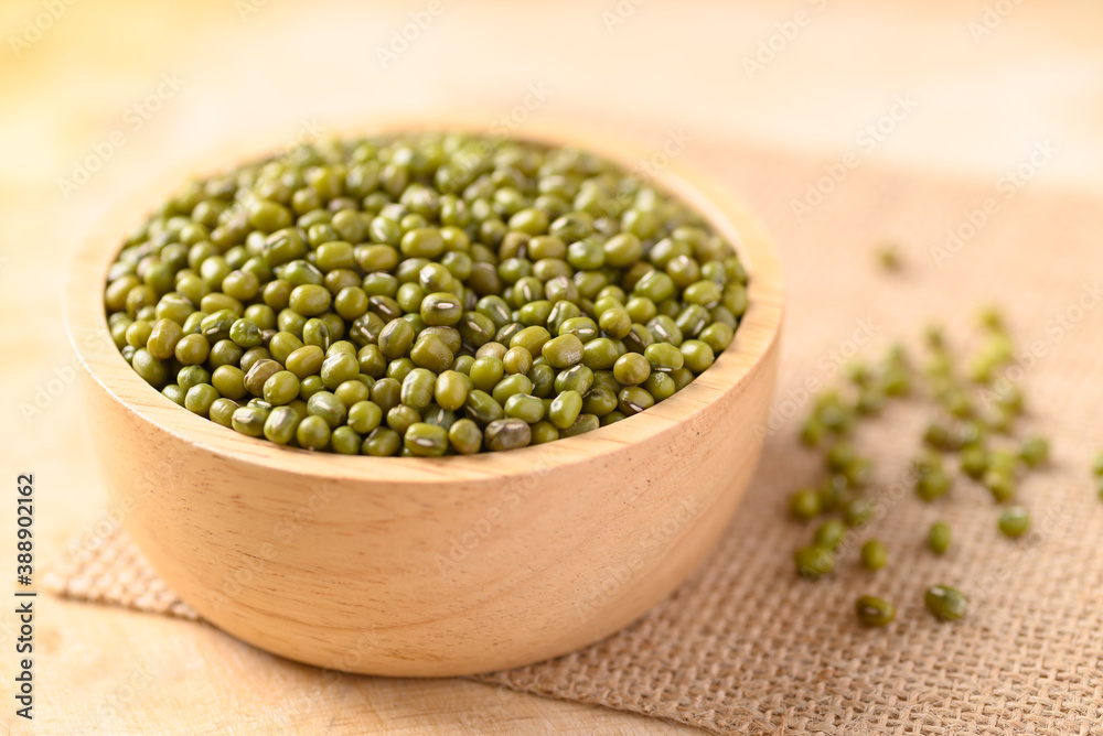 Mung bean in a bowl on wooden background Mung bean in a bowl on wooden background