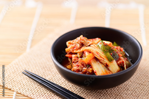 Korean food, Kimchi cabbage in a bowl with chopsticks