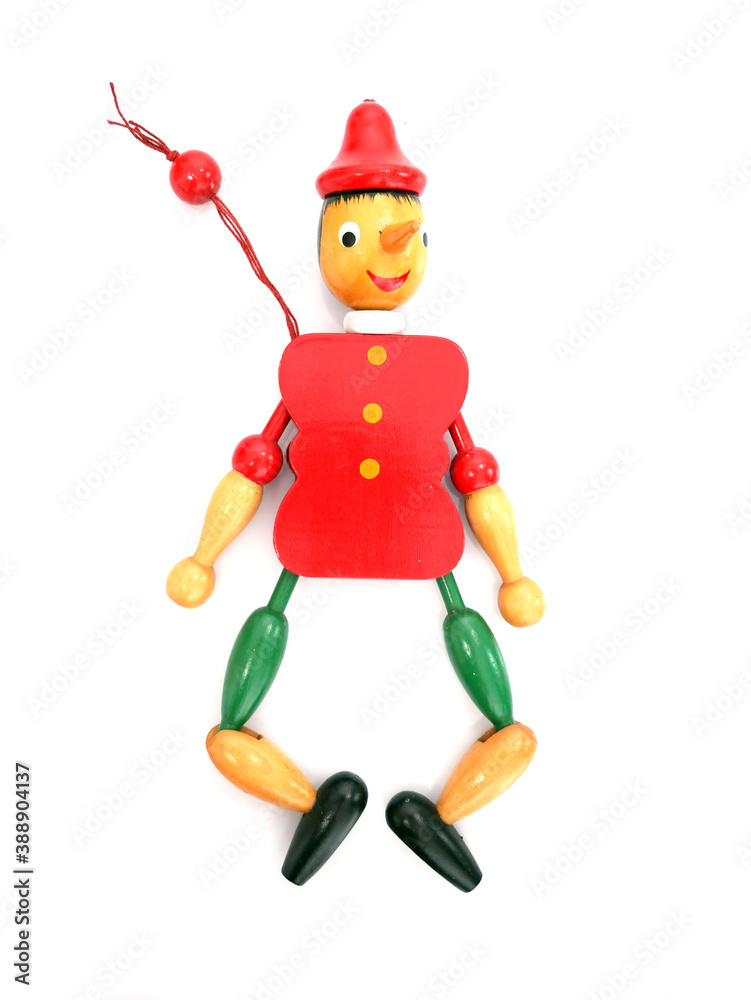 Smiling Pinocchio made of wood. Toy with moving parts. Smiling Pinocchio made of wood. Toy with moving parts.