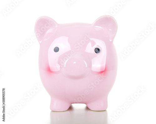 A pink piggy bank on white background