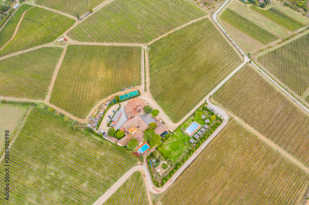 Aerial view of a winery and grape vines in Greve in Chianti. Tuscany, Italy.