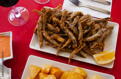 Roasted anchovies with lemon, popular spanish dish