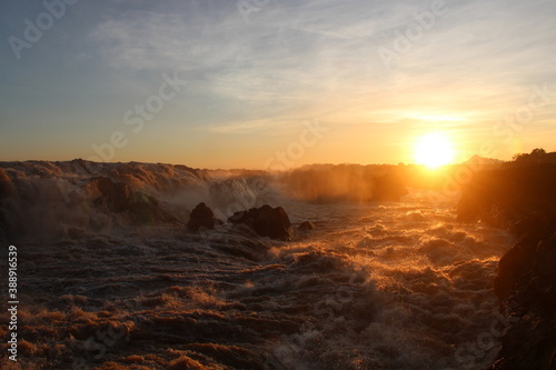 Cambodia. Sunrise on the Mekong River in Stung Treng province, bordering Laos.