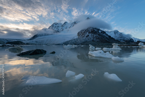 Snow mountain scenery surrounded by clouds