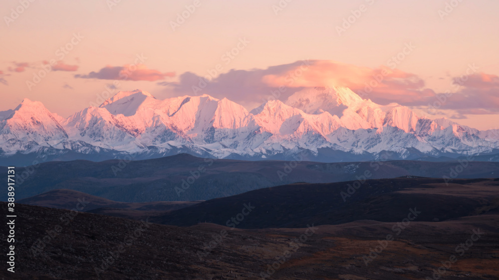 Sunset scenery on the snow mountain