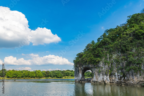 The scenery of Elephant Trunk Hill under the blue sky and white clouds