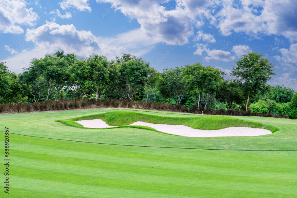 Beautiful green view at golf course ,green trees and mountain blue sky white cloud background