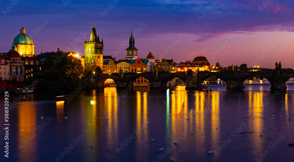 Picturesque view of city of Prague and Charles Bridge at night, Czech Republic