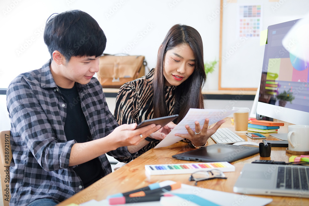Team of professional designers working with new startup project in modern office. Team of professional designers working with new startup project in modern office.