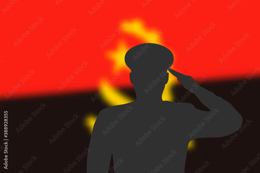 Solder silhouette on blur background with Angola flag.