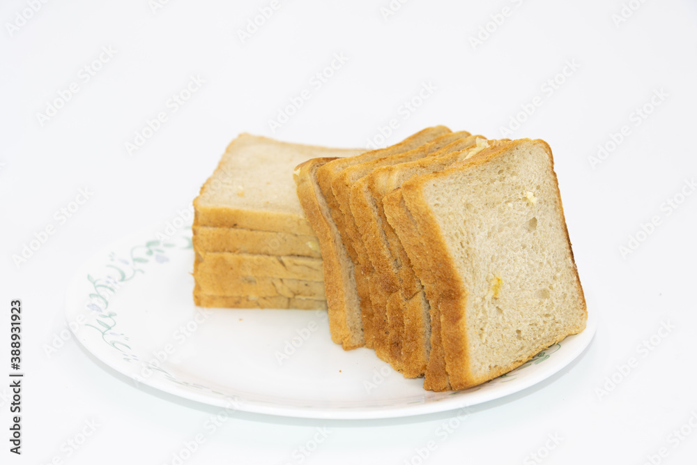 Slices of freshly baked bread kept on plate