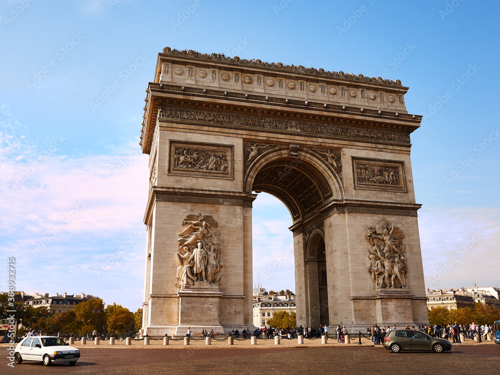 Paris Arc de Triomphe ,Triumphal Arch, place Charles de Gaulle in Chaps Elysees at sunset, Paris, France.