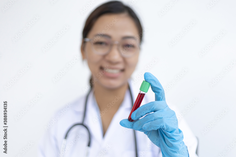 Scientists or physicians analyze the blood sample in vitro to prepare a vaccine against a new strain of viruses. Scientists or physicians analyze the blood sample in vitro to prepare a vaccine against a new strain of viruses.