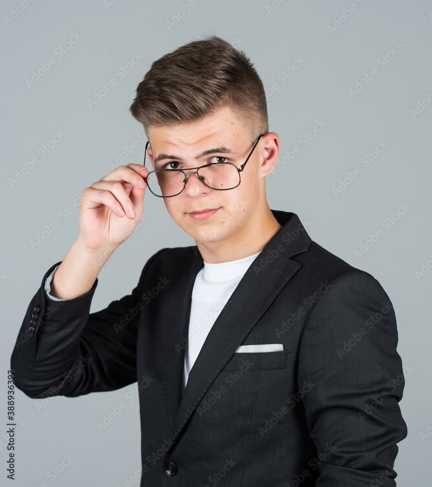 young businessman in glasses. concept of vision. male barbershop. mens beauty standards. small business owner. smart student wear glasses. fashion model teen. teen boy wear black formal jacket young businessman in glasses. concept of vision. male barbershop. mens beauty standards. small business owner. smart student wear glasses. fashion model teen. teen boy wear black formal jacket