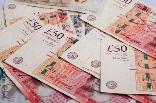 UK pound,money of United kingdom close up on white, Pound UK note photo