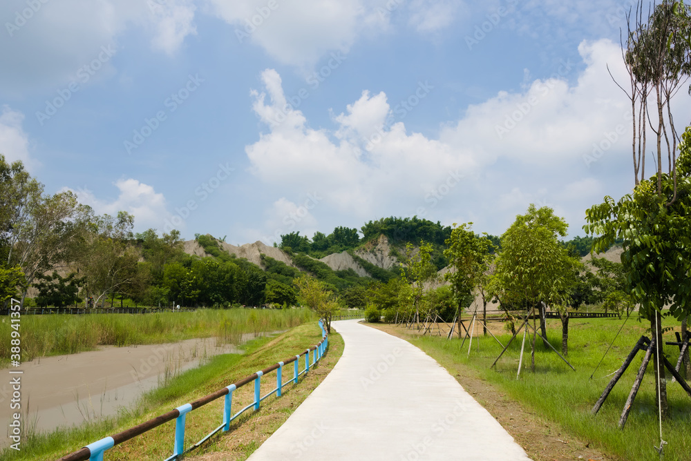 Mudstone badland geopark Kaohsiung. Pathway close to the badlands hill in the park.
