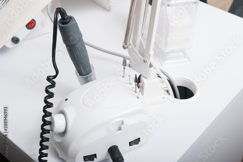 Close up photo of machine for brushing nails, Machine for removing gel from nails.