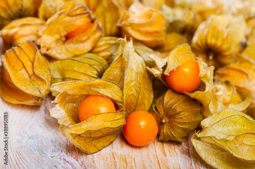 Physalis peruviana yellow  edible physalis species. Vegetarian dish. Healthy life experience