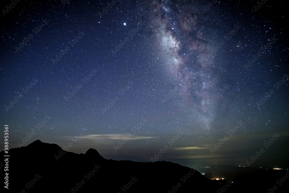 Amazing stary night above the mountain range in Doi Luang National Park, Thailand.