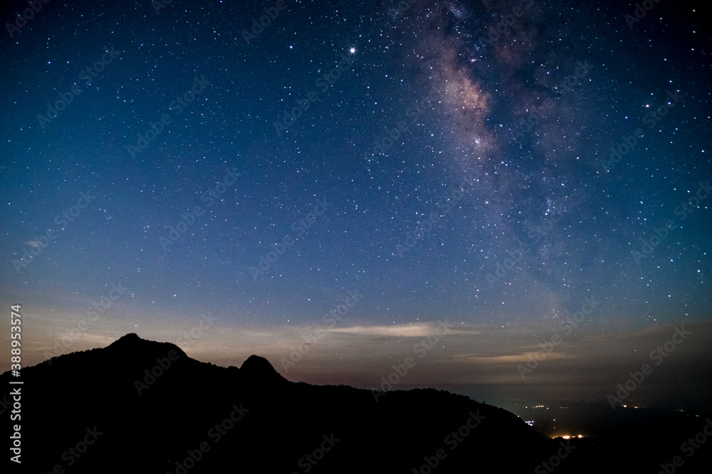 Amazing stary night above the mountain range in Doi Luang National Park, Thailand.