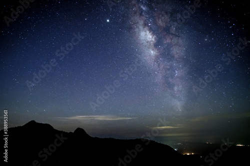 Amazing stary night above the mountain range in Doi Luang National Park, Thailand.