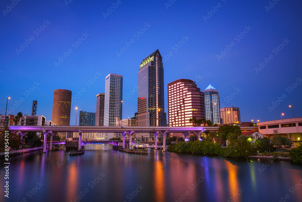 Tampa skyline after sunset with Hillsborough river in the foreground