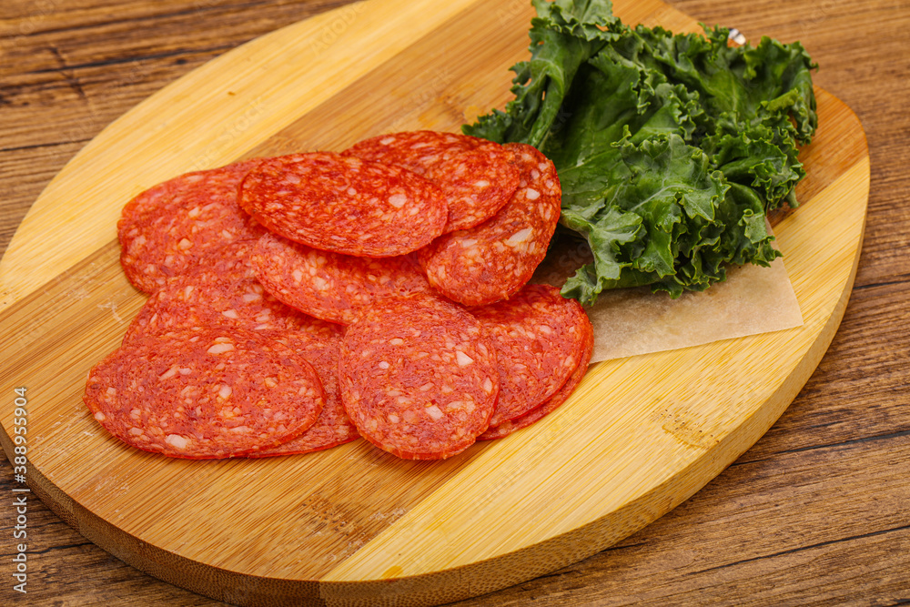 Italian spycy pepperoni sausage slices Italian spycy pepperoni sausage slices