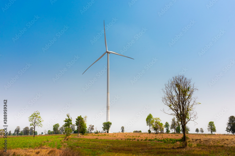 Fototapeta premium Wind turbines for electric power production. Green ecological power energy generation.