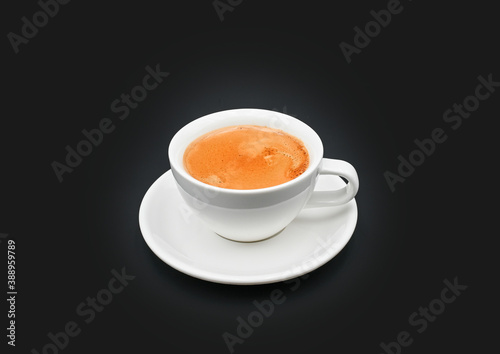 FROTHY BLACK COFFEE IN A COFFEE CUP