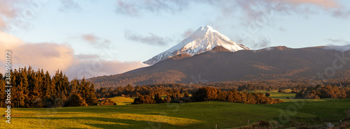 Picturesque rural landscape with mount Taranaki snow top